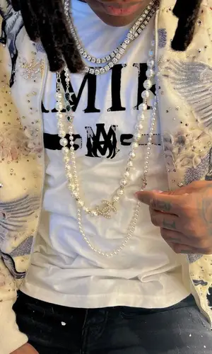 Lil Durk wearing Amiri t-shirt