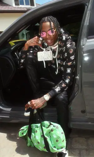 Soulja Boy wearing Soulja Boy Merch bag