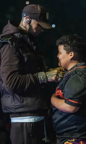 Anuel AA wearing Amiri hoody