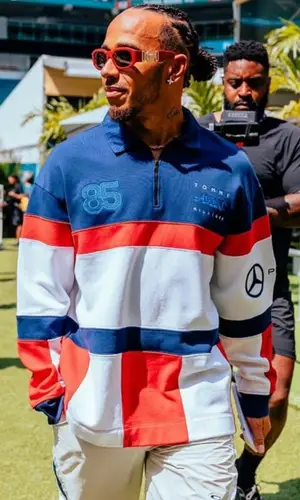 Lewis Hamilton’s Outfit in Awake NY Shirt, Versace Eyewear & Tommy Hilfiger (2023)