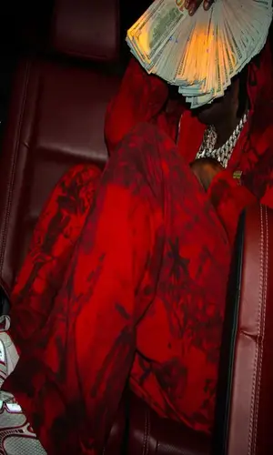EST Gee wearing Balenciaga pants