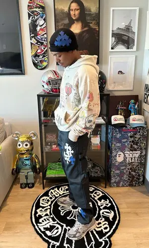 Lil Meech wearing Saint Michael hoody