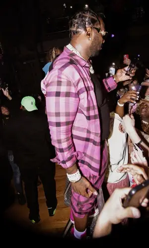 Peezy wearing Rick Owens shirt