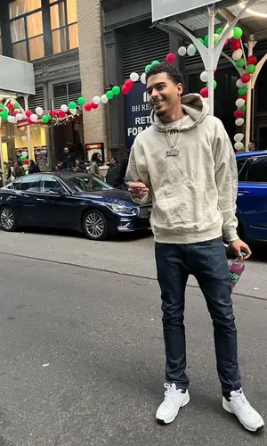 Jay Critch’s Outfit in Denim Tears Hoodie, Celine Jeans & Chanel Sneakers (2023)