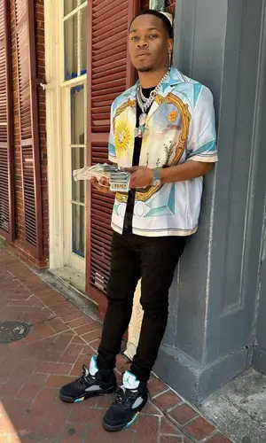 Kenny Muney wearing Amiri shirt
