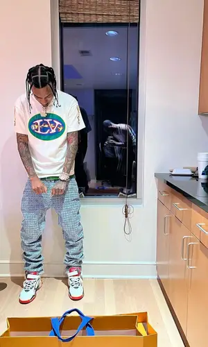KSupreme wearing Givenchy jeans