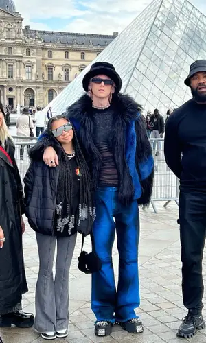 Machine Gun Kelly wearing A Better Mistake hat