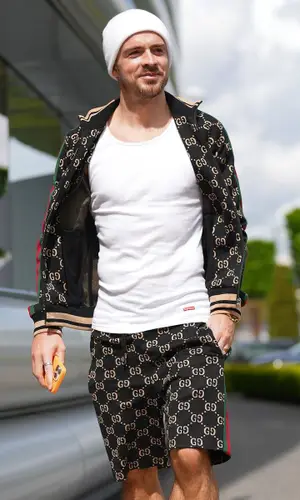 Jack Grealish wearing Gucci shorts