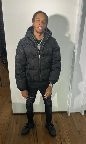 Kirky wearing Gucci jacket