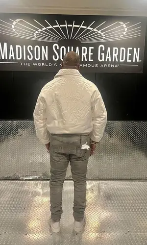 Busta Rhymes’ Outfit in Louis Vuitton Jacket, Loewe T-Shirt & Purple Brand Jeans (2023)