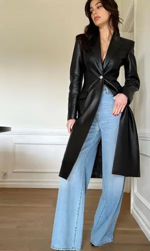 Camila Morrone wearing Versace jeans