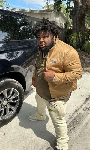 Rod Wave wearing Gallery Dept. jacket