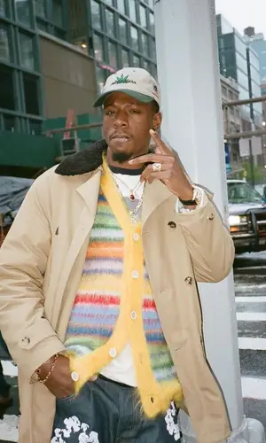 Joey Badass’ Outfit in Marni Jacket, Levi’s Jeans & Denim Tears (2023)