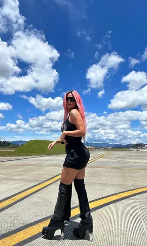 Karol G wearing Rick Owens boots