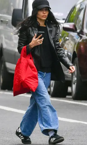 Zoe Kravitz wearing Adidas sneakers