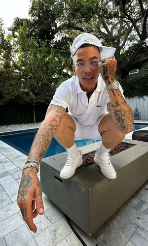 Sfera Ebbasta wearing Lacoste shirt