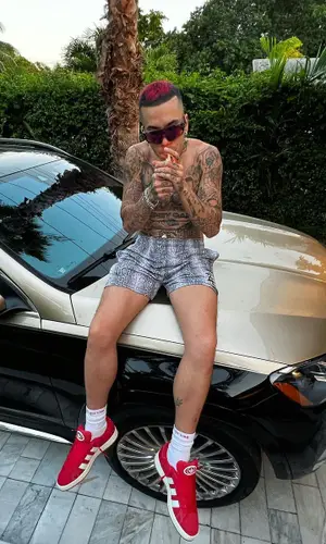 Sfera Ebbasta wearing Supreme sock