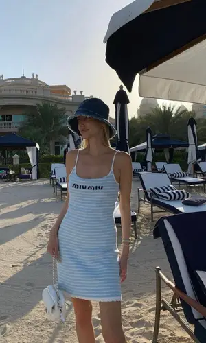 Leonie Hanne’s Outfit in Chanel Bag & Miu Miu Hat (2023)