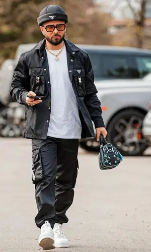 Lorenzo Insigne wearing Prada pants