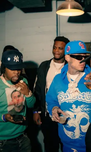 Millyz wearing New Era cap