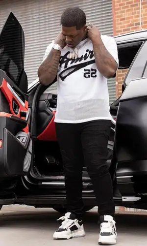 Lil Zay Osama wearing Amiri t-shirt