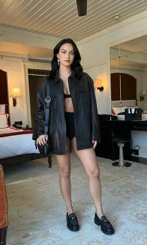 Camila Mendes wearing Coach bag