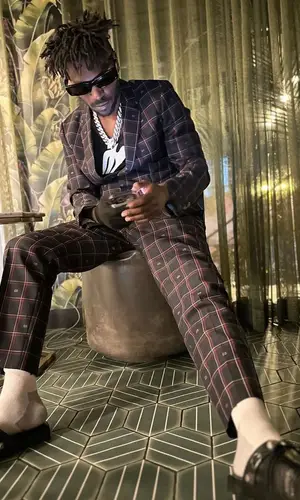 Antonio Brown wearing Gucci jacket
