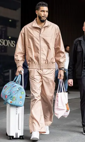 Jayson Tatum wearing Louis Vuitton bag