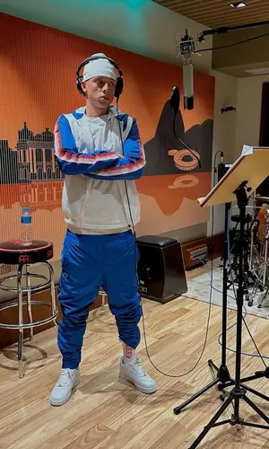 Central Cee wearing Lacoste jacket