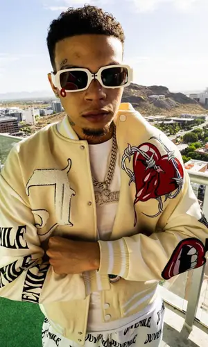 D Savage wearing Juvenile jacket