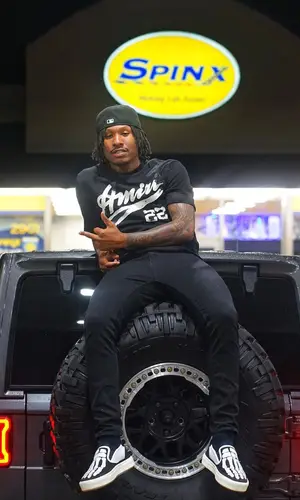 Duke Dennis wearing Amiri jeans