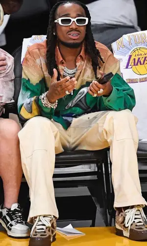 Quavo wearing Louis Vuitton shirt