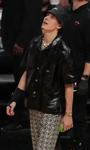 Tyler Herro wearing Marine Serre pants