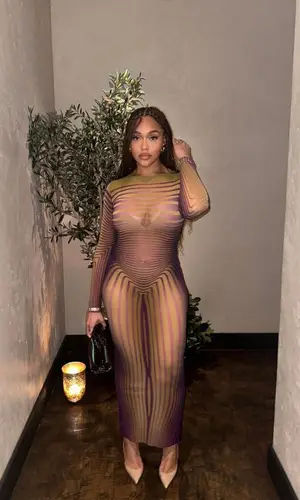 Jordyn Woods’ Outfit in Bottega Veneta Bag, Jean Paul Gaultier & Christian Louboutin (2023)