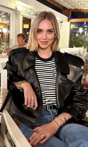 Chiara Ferragni’s Outfit in Saint Laurent Jacket, Gucci Sneakers & Miu Miu Bag (2023)