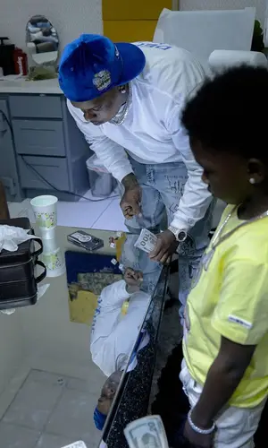 Finesse2tymes’ Outfit in Gallery Dept. T-Shirt, New Era Cap & Supreme (2023)