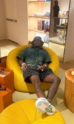Sauce Walka wearing Louis Vuitton shirt