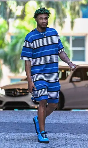 Marcus Smart wearing Burberry shorts