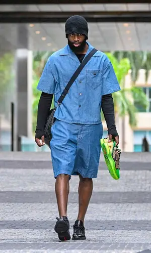 Jaylen Brown’s Outfit in Prada Shirt & Louis Vuitton Bag (2023)