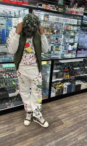 Lil Migo wearing Rick Owens sneakers