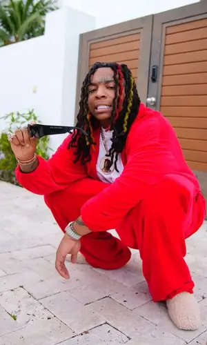 Lil Gotit wearing Balenciaga sandal