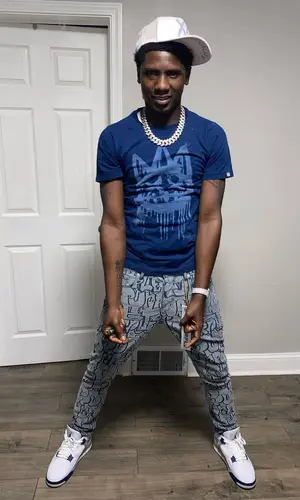 PGF Nuk’s Outfit in Purple Brand Jeans, Jordan Sneakers & Cult of Individuality Cap (2023)