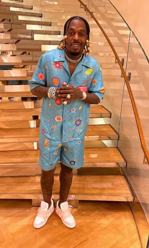 Sauce Walka wearing Louis Vuitton shirt