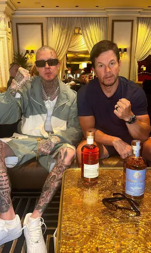 Millyz wearing Rhude jacket