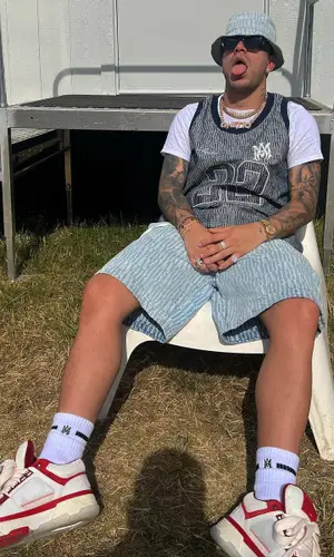 Ryan Castro’s Outfit in Palm Angels Eyewear & Amiri Hat (2023)