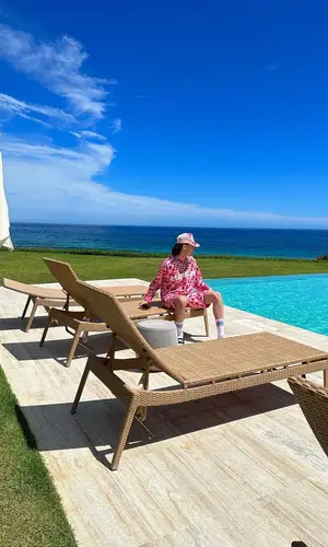 Peso Pluma’s Outfit in Bape Hat & Balenciaga Sandals (2023)