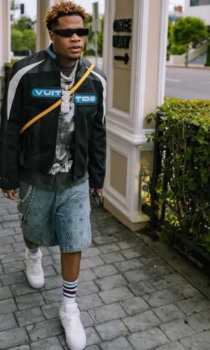 Devin Haney’s Outfit in Louis Vuitton Jacket, Rick Owens Eyewear & Chrome Hearts Socks (2023)