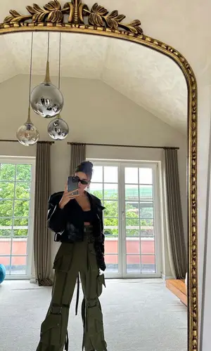 Hande Erchel wearing Alexander McQueen boots