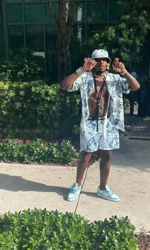 Sauce Walka wearing Louis Vuitton hat