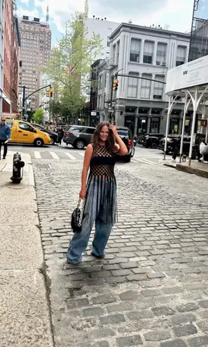 Chrissy Teigen wearing Dries Van Noten top
